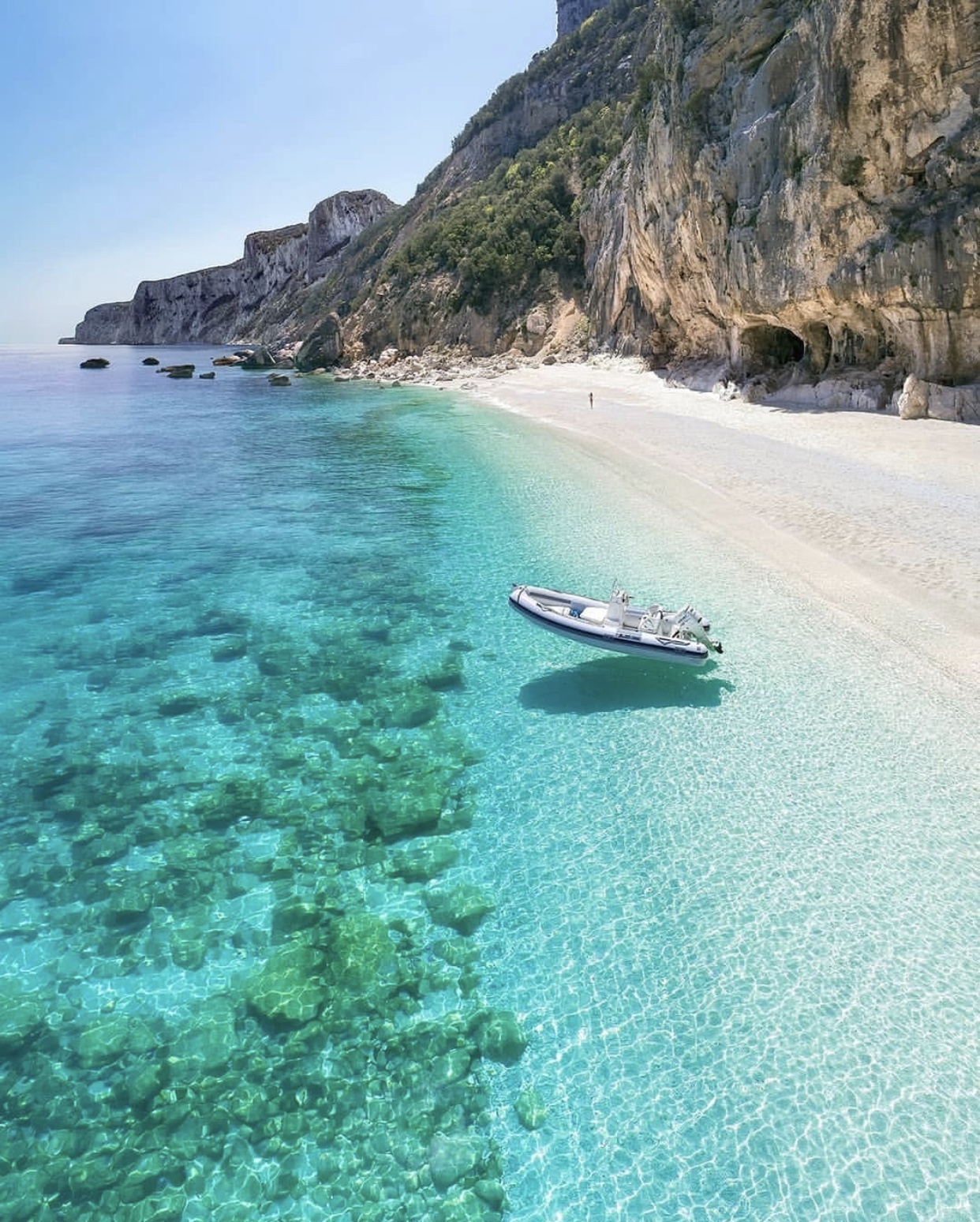 Sardinia is famous for it's crystal clear waters and is one of the best places to visit in Italy if you want to enjoy the mediterranean! 